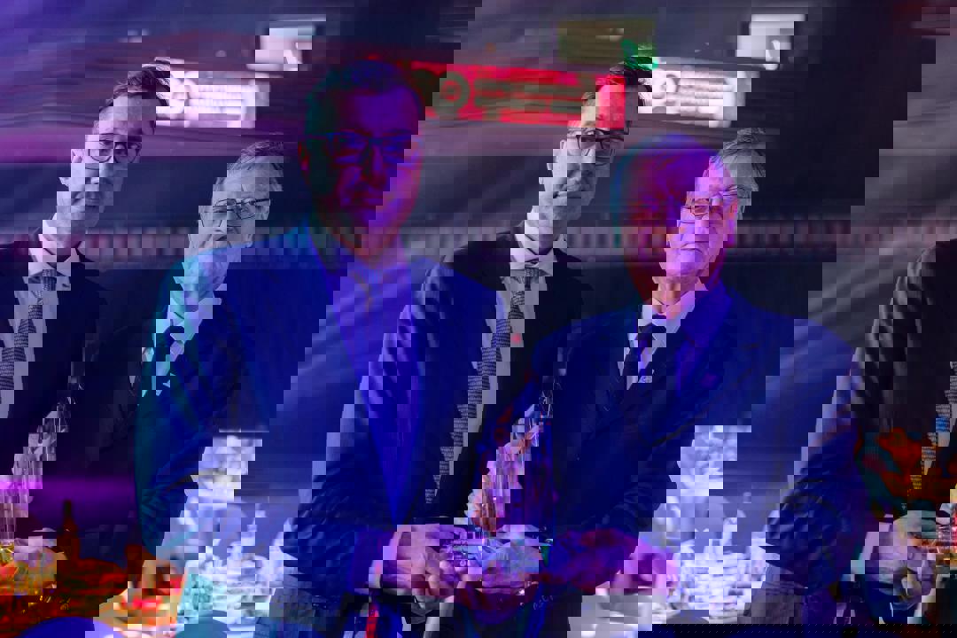 Александр Борічіч і президент російської Федерації волейболу Станіслав Шевченко святкують 100-річчя волейболу у РФ