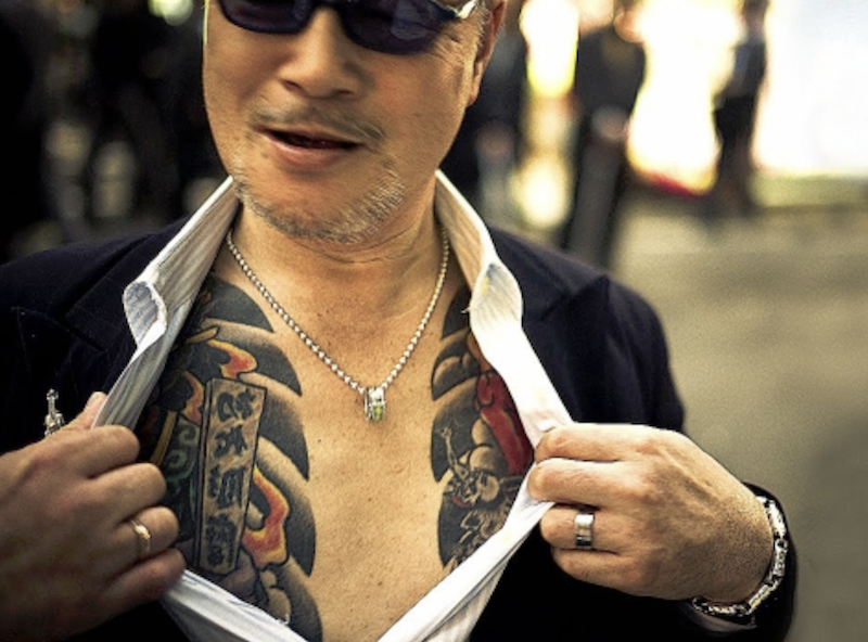 Якудза с татуировкой