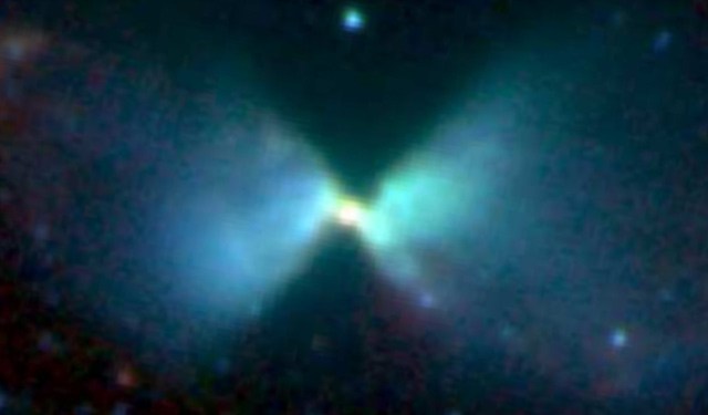 Деформированный протопланетный диск L1527. Космический телескопа Spitzer