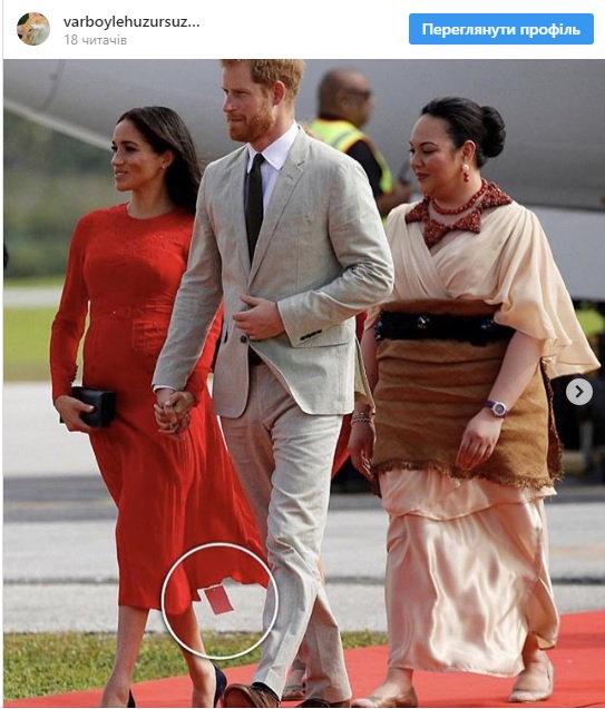 Герцогиня Сассекская Меган Маркл в красном платье с цеником