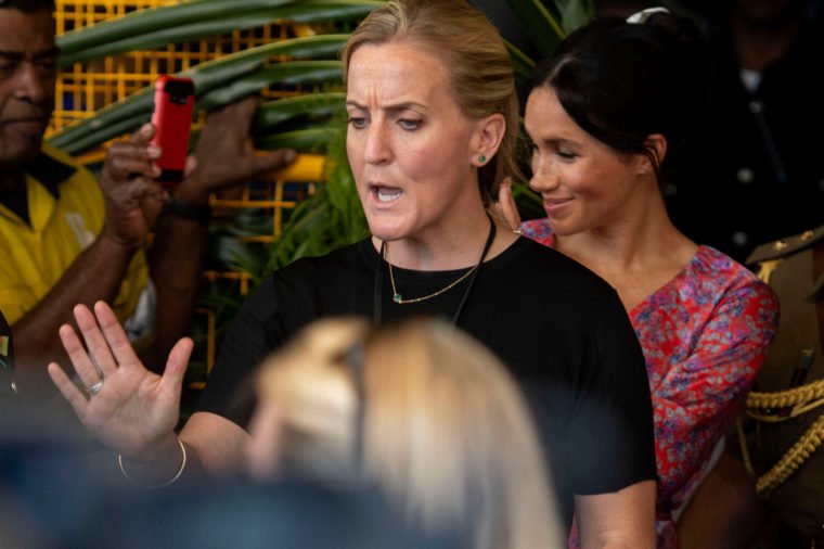 Иеган Маркл с телохранителем