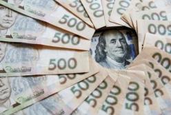 Как транш от МВФ на курс гривны влияет