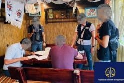 В Черкассах задержали чиновника на взятке в $40 тысяч (фото)