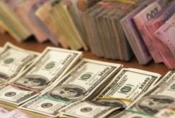 Курс валют на 21 декабря: гривна установила новый рекорд