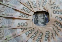Гривна за год обесценилась почти 20%
