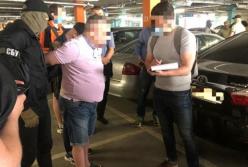 В Киеве задержали экс-банкира, "торговавшего" должностями в Нацбанке (фото)