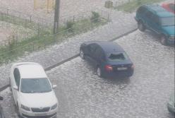 В России выпал гигантский град, разбив десятки машин (фото, видео)