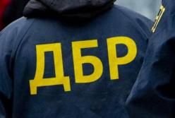 Чиновнику ГМС сообщили о подозрении из-за оформления паспортов по завышенной цене