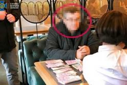 Главу общественной организации из Черниговской области задержали за вымогательство денег с коммерсантов (фото)