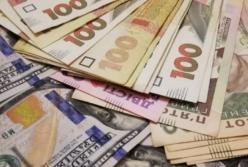 Что будет с курсом доллара в 2022 году: прогноз банкиров