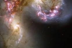 Космический телескоп Hubble снял галактики, разрывающие друг друга (фото)