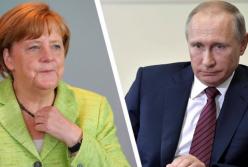 Путин пообещал Меркель продолжение транзита газа через Украину