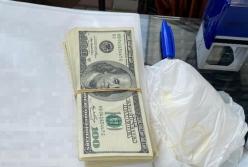 В Киеве арбитражный управляющий требовал от частного застройщика взятку $100 000 (фото)