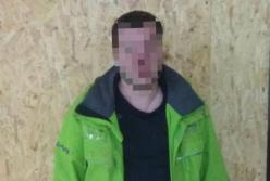 В Запорожье мужчина бросил собаку с моста на железнодорожные пути