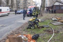 В Киеве в люке теплотрассы нашли три трупа (фото)