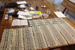 Киевский полицейский отказался от взятки $12 тыс