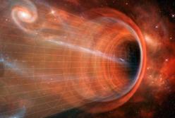 Ученые открыли гигантскую черную дыру, которая "захватила в плен" шесть галактик