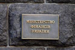 Украина наращивает долги в гривне и долларах