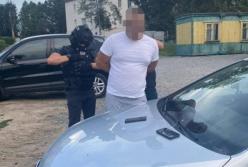 В Хмельницкой области на взятке задержали двух полицейских (фото)