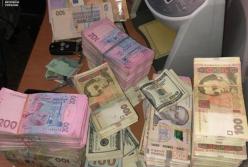 В Украине блокировали сеть по легализации доходов через криптовалюты (фото)