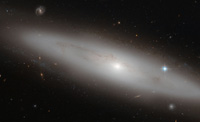 Линзовидная галактика – взгляд Хаббла