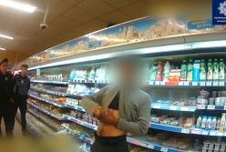 В супермаркете Сум мужчина грозился вспороть себе живот разбитой бутылкой из-за ссоры с мамой (видео) 