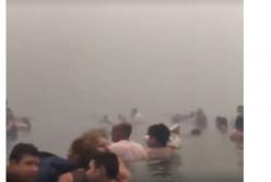 Прибрежная зона Мати, Греция, укрывается от лесных пожаров в море (видео)