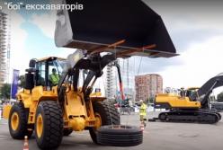 «Бои» экскаваторов: в Киеве проходят необычные соревнования (видео)