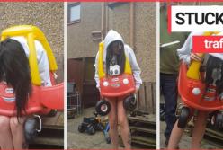 Девушка застряла в детской машинке (видео)