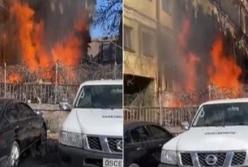 Пожар в Киеве: люди помогали спасать автомобили