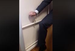 Адвокат приковал себя наручниками к трубе в киевском суде (видео)