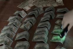 Полицейский вымогал взятку за сокрытие доказательств за хищение имущества (видео)