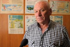 На шее удавка, к ногам привязан камень: водолазы нашли тело убитого таксиста (видео)