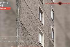 В Днепре пьяные мужчина и женщина стреляли с балкона многоэтажки (видео)