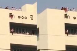 Девочку спасло платье от падения с крыши многоэтажки (видео)