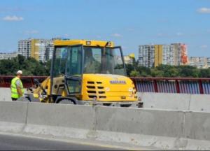 300 миллионов на ремонт моста в Днепре разыграют не чужие друг другу фирмы