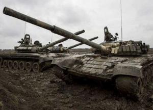 В ОРДЛО окупанти розміщують танки і артилерію на лінії відведення. 