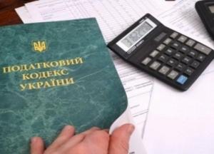 Квартиры, земля, алкоголь и сигареты: как изменит жизнь украинцев новый налоговый закон