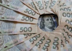 Гривна за год обесценилась почти 20%