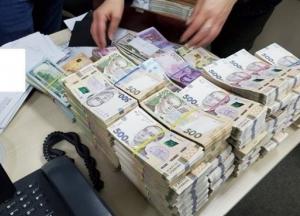 НБУ насчитал "на руках" у населения до $35 млрд