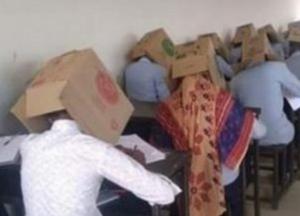 В Индии студенты сдавали экзамен с коробками на головах (фото)