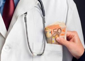 Массовые обыски в больницах и домах: у руководителя Львовского онкоцентра изъяли более 2 млн грн наличными