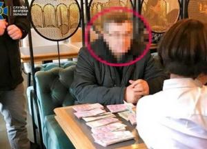 Главу общественной организации из Черниговской области задержали за вымогательство денег с коммерсантов (фото)