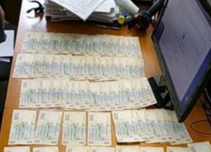 В Киеве при получении взятки задержан полицейский 