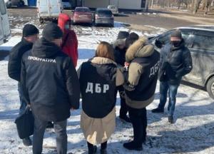 В Харькове полицейский требовал у знакомых взятку (фото)